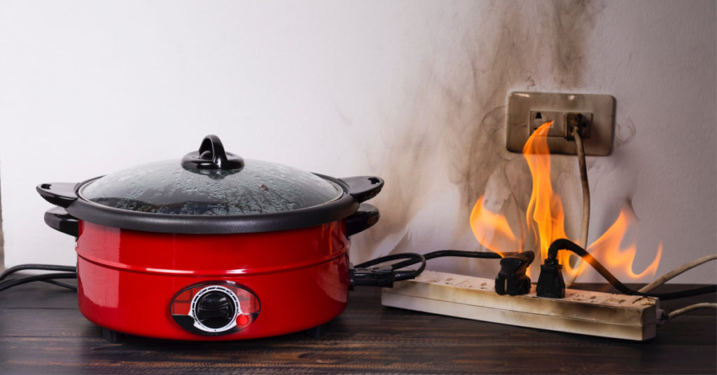 wall outlet on fire due to defective product of slow cooker