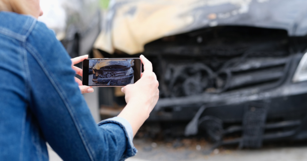 gather evidence in accident with woman taking pictures after car accident